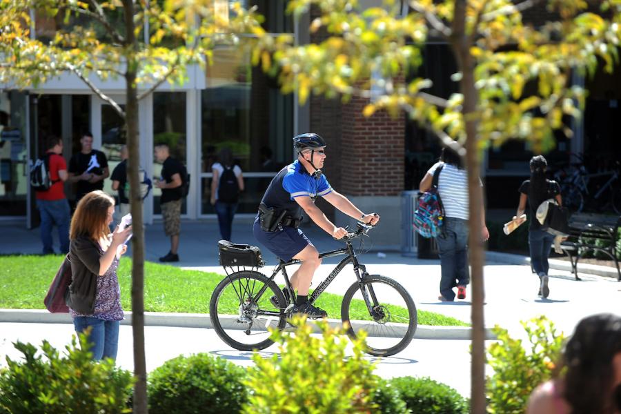 KSUPD officers patrol campus on foot, by bicycle and in police vehicles.