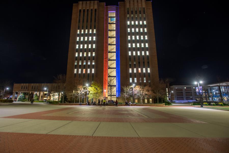 The Kent State University Library, lit in red, white and blue for Veterans Day