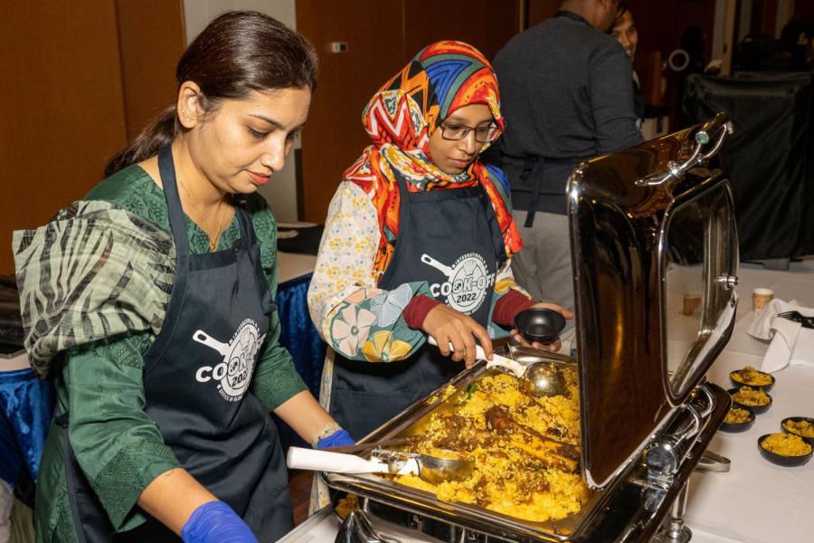 Team Bangladesh serves mutton briyana, a dish that garnered the People's Choice Award at the 2022 Annual International Cook-off.
