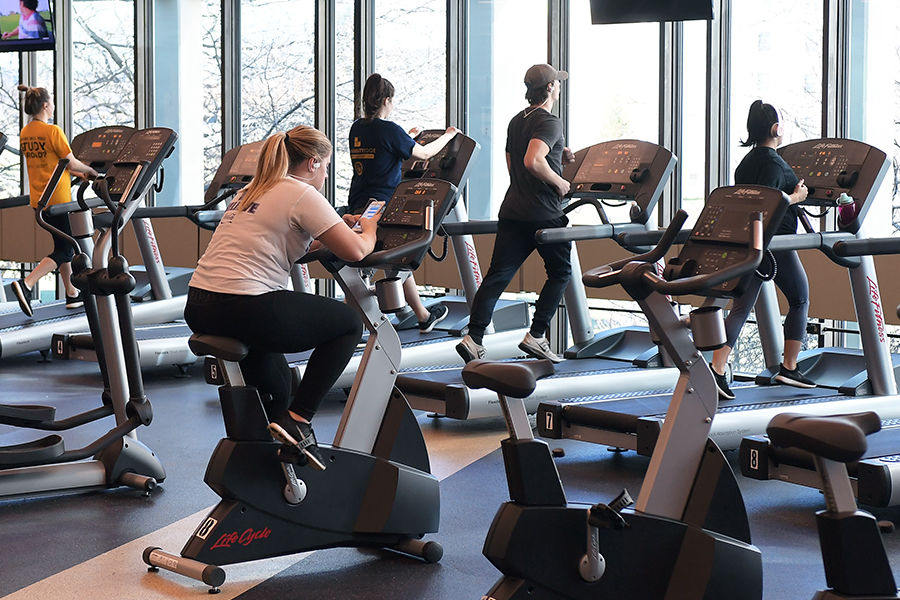 Kent State students work out in Tri-Rec, a new fitness facility in the Tri-Towers Rotunda exclusively for on-campus residents.