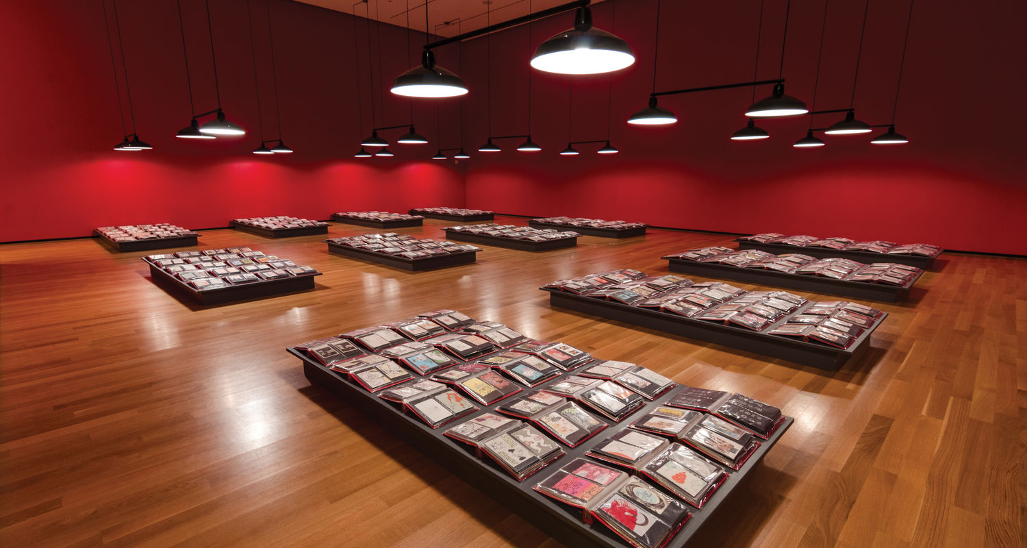 Curator Adam Lerner refers to the more than 30,000 postcard-size drawings, prints and collages that Mothersbaugh has made for the past 40 years—all on view at the Akron Art Museum—as “the archive of Mark’s brain.” Photo: Joe Levak