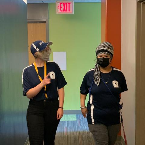 Security Assistants walk the residence hall.