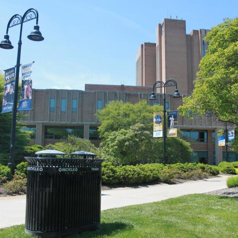 Recycling bins outside the Kent State University Library