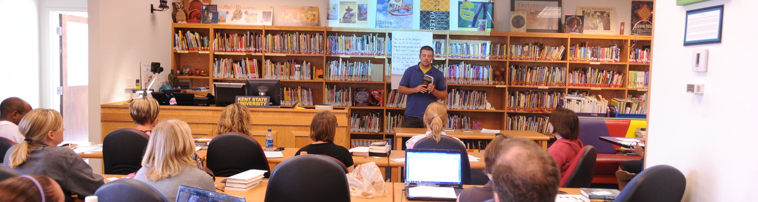 Students attend a workshop in the Reinberger Children's Library Center in SLIS.
