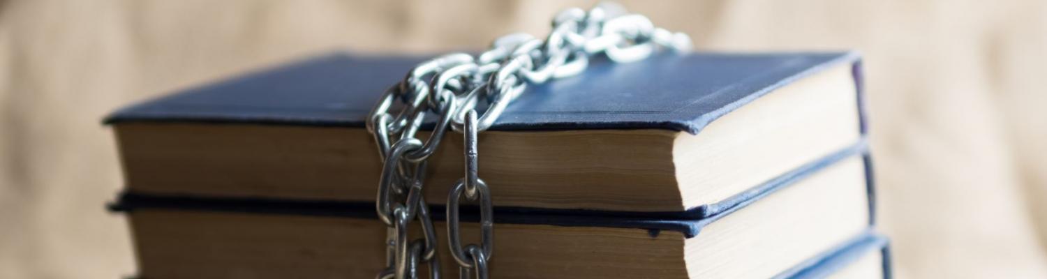 Book with chains to represent banned books