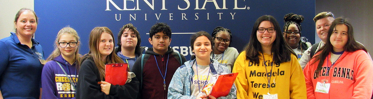 Rising Scholars program students standing next to mentors