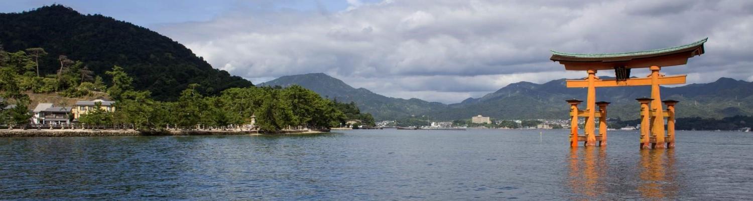 A large tori gate submerged in water at Miyajima Island in Japan.