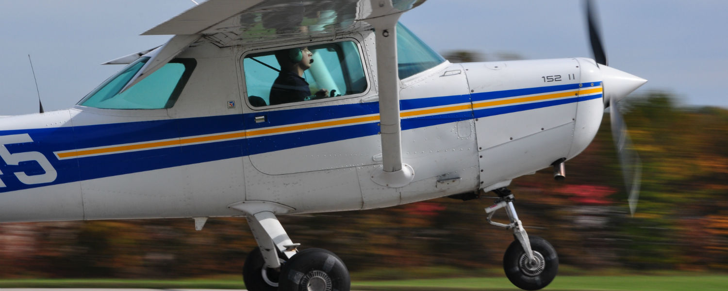 A KSU Aeronautics Cessna 152 landing at the Kent State University Airport.
