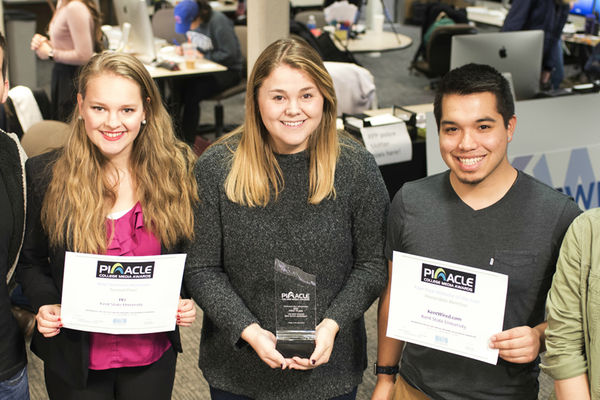 TV2 News Director Adam Kirasic, TV2 General Manager Anna Huntsman, The Kent Stater Editor Lydia Taylor, KentWired Digital Director Ray Padilla and The Kent Stater Managing Editor Jenna Kuczkowski pose with their awards.