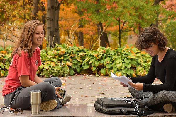 Two students talking outside