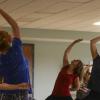 Kent State University employees participate in the Lunchtime Rejuvenation Yoga session – a regular wellness offering on Tuesdays and Thursdays.